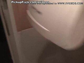 Two amateur brunettes give a public blowjob in the toilet cafe