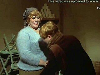 Teen boy gives a blowjob to busty MILF in retro movie